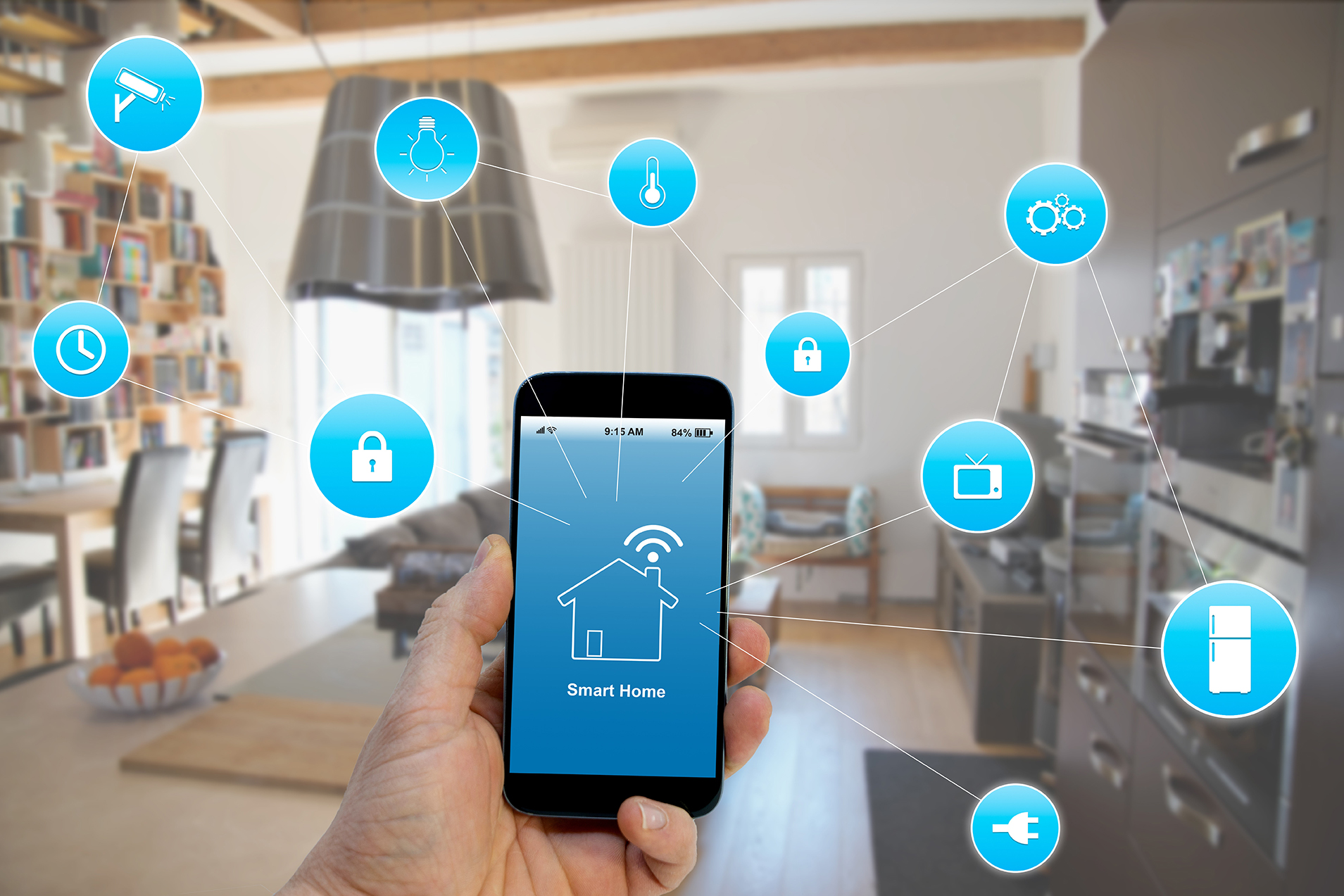 A man is holging a mobile in his hand and it looks like that he can control his smarthome with his mobile. In the background there is a beautiful home with different devices, for exmaple tv, windows, lights